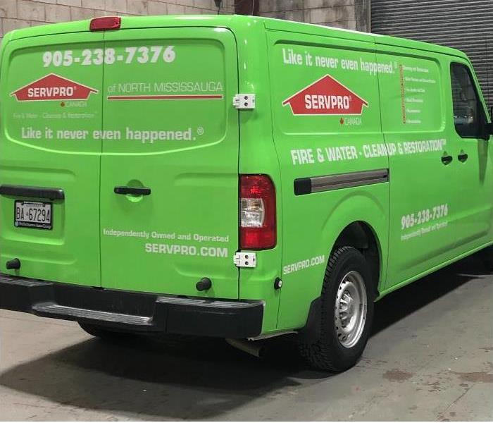 SERVPRO van parked in a warehouse